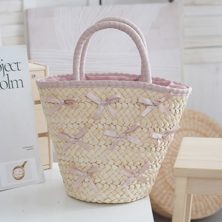 Basket bag with delicate bows and Bowlift lining