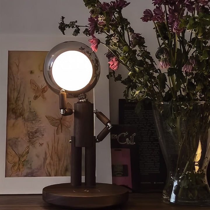 Bamboo articulated magnetic desktop lamp with mirrored orb head Bowlift