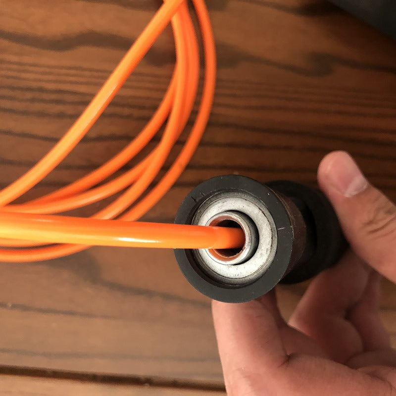 Jump rope with non-slip grips and adjustable cord Bowlift