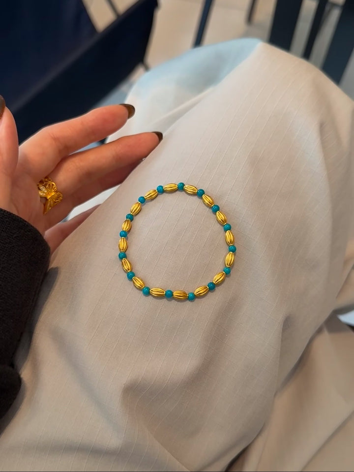 Playful Beaded Charm Bracelet Bowlift