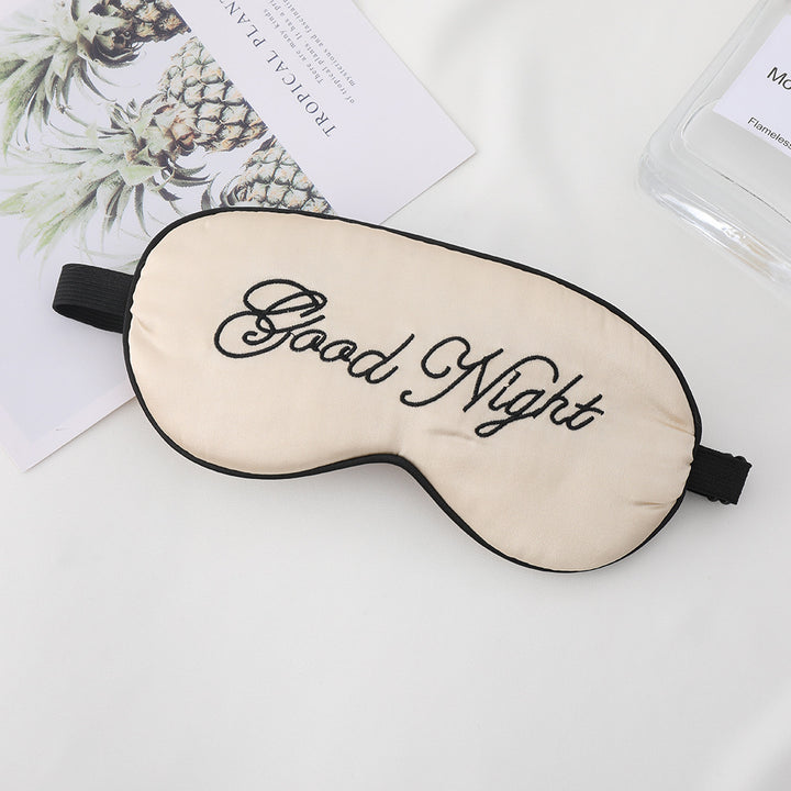 Unisex embroidered contoured sleep mask with decorative text embroidery and adjustable elastic band Bowlift