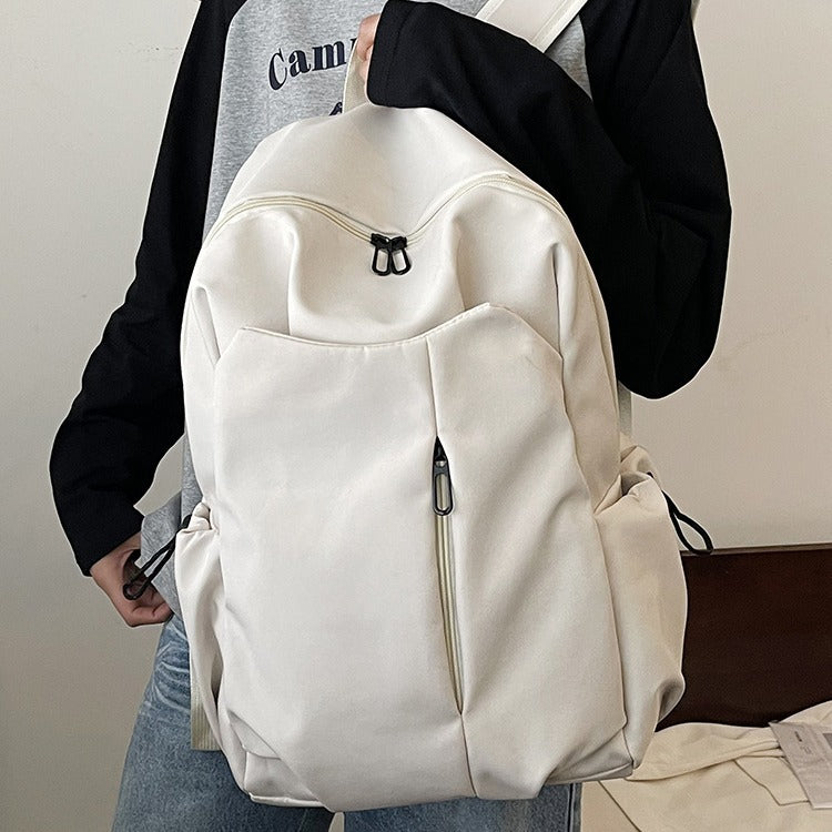 Backpack with Versatile Compartments and Charming Pendant Bowlift