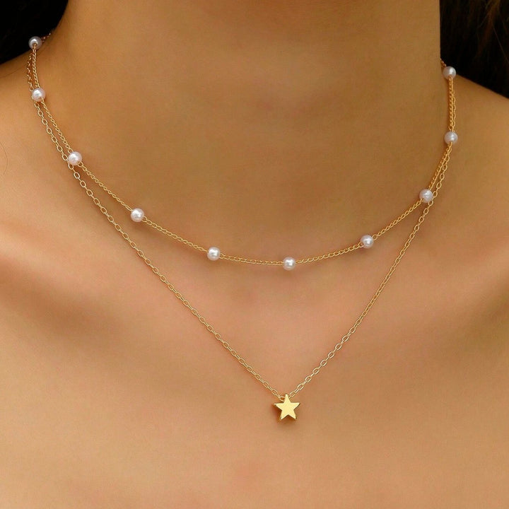Layered Pearl and Star Charm Necklace Bowlift