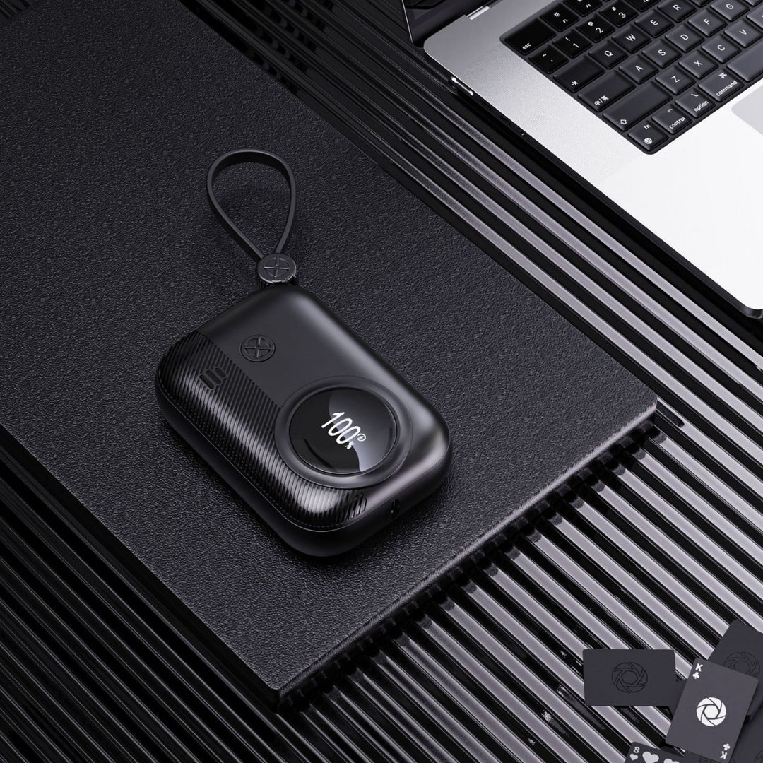 Compact power bank with integrated charging plug and digital humidity indicator Bowlift