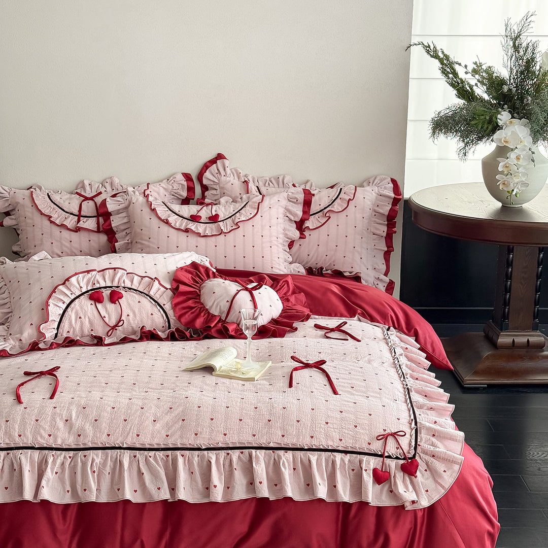 Romantic cotton bedding set with ruffle, heart embroidery and decorative pillow Bowlift