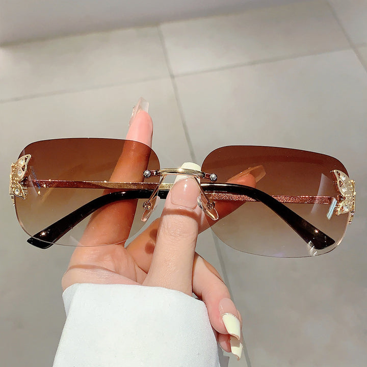 Ladies fashionable sunglasses with delicate butterfly design and protective lenses Bowlift