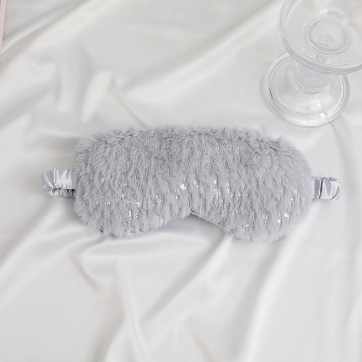 Unisex soft eye mask made of faux fur with festive motif embossing Bowlift