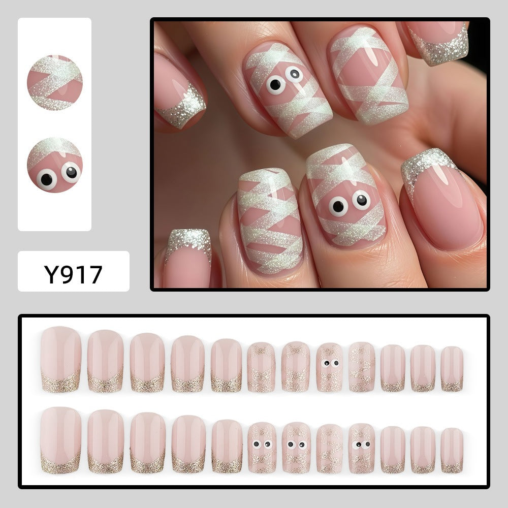 Artificials nails with playful eye design and glitter tips Bowlift