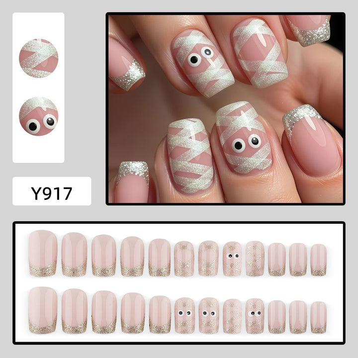 Artificials nails with playful eye design and glitter tips Bowlift