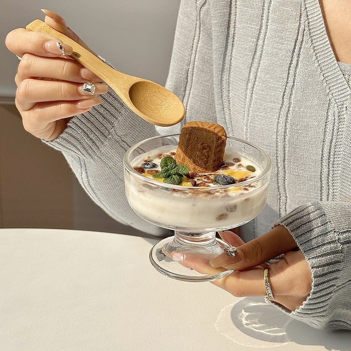Footed glass dessert bowl with wide rim pedestal base for serving and display Bowlift