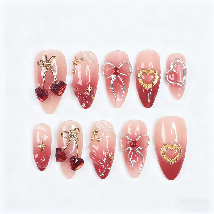 Decorative artificial nails with romantic heart and bow motifs Bowlift