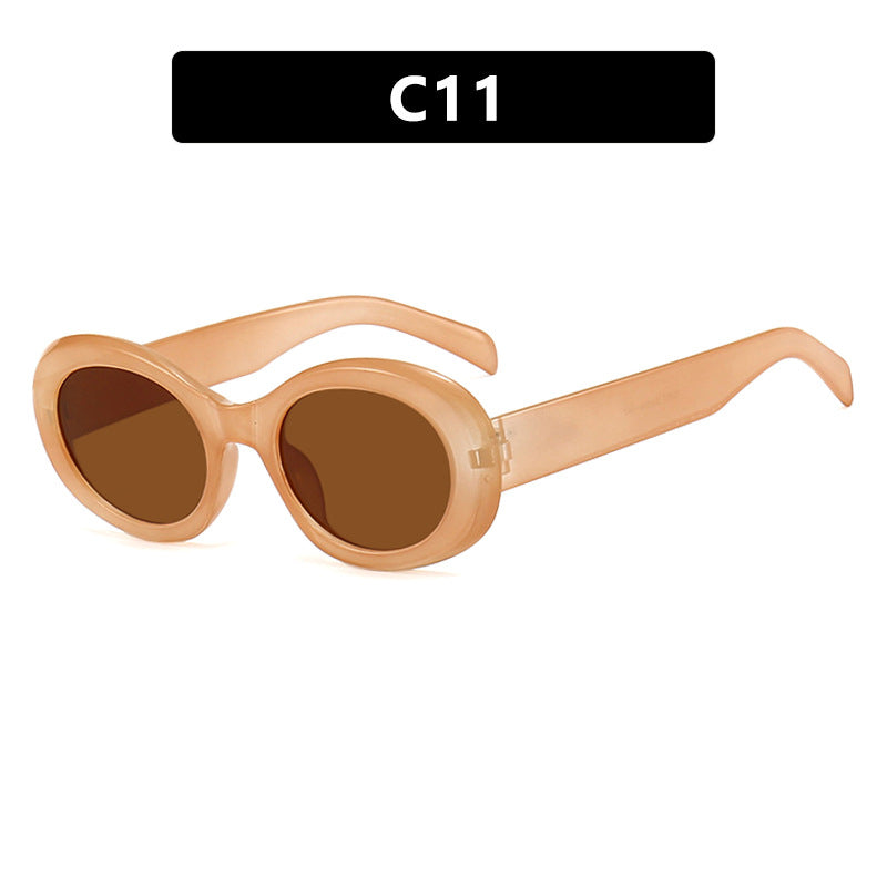 Women's fashionable sunglasses in original oval design with transparent frame and UV protection Bowlift