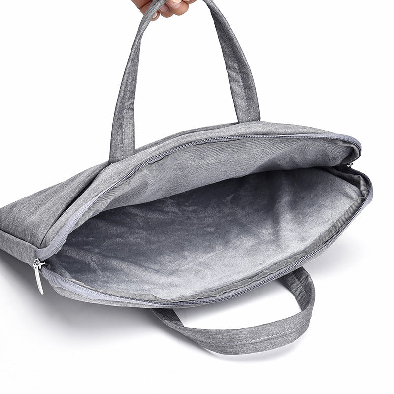Laptop and briefcase in modern, minimalist design Bowlift