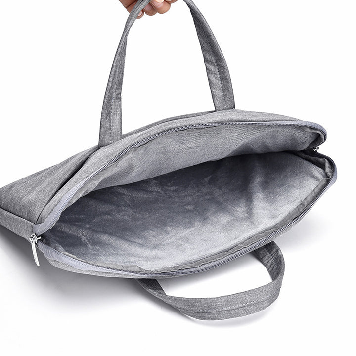 Laptop and briefcase in modern, minimalist design Bowlift
