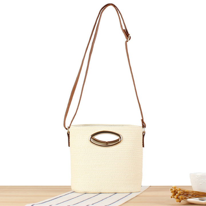 Shoulder bag made of handwoven natural material with elegant handle Bowlift