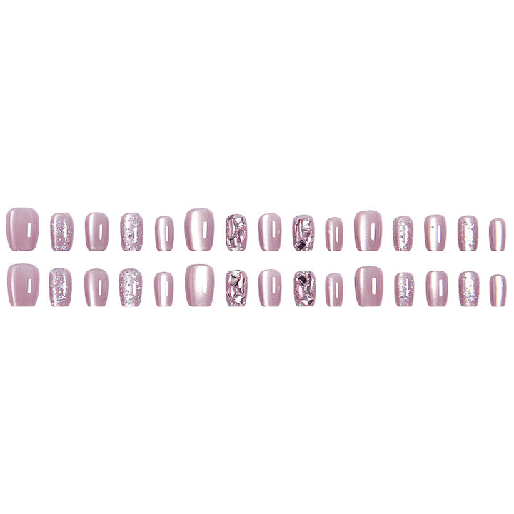 Artificial nail set with glitter and metallic effects Bowlift