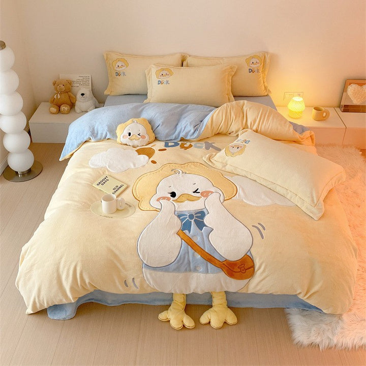 Cozy reversible bedding set with embroidered duck motif, appliqués, and Bowlift cuddle pillow