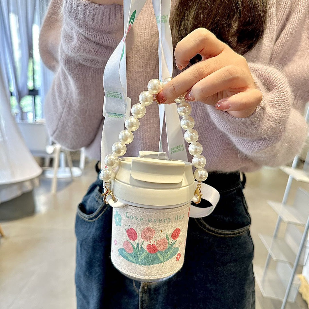 Women's insulated bottle with practical pearl carrying strap Bowlift