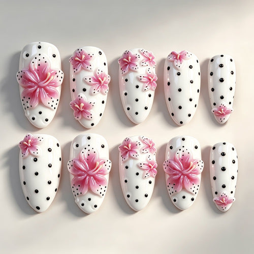 Artificial nail set with floral accents and polka dots Bowlift