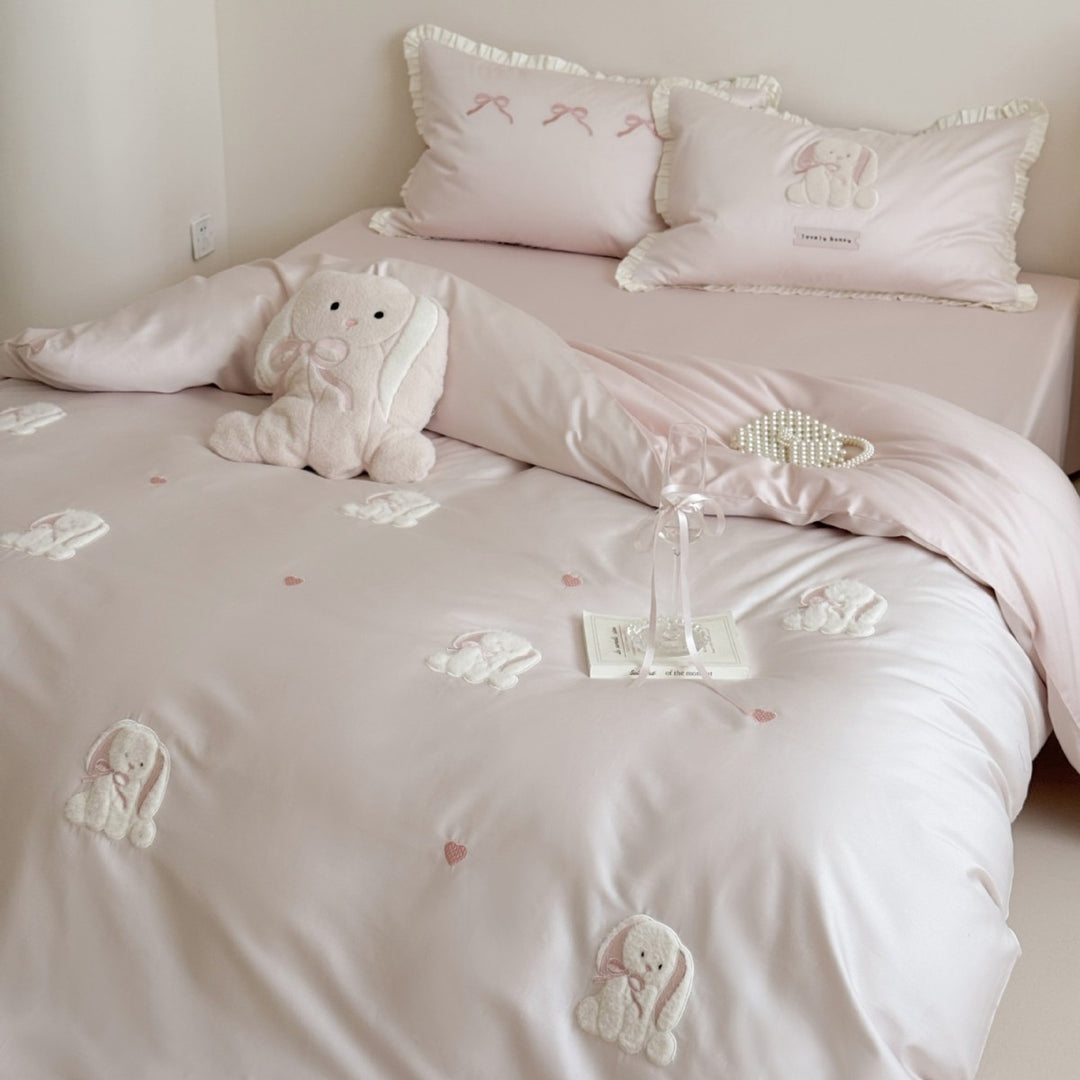 Luxurious cotton satin bedding set with embroidered bunnies and ruffled pillow Bowlift