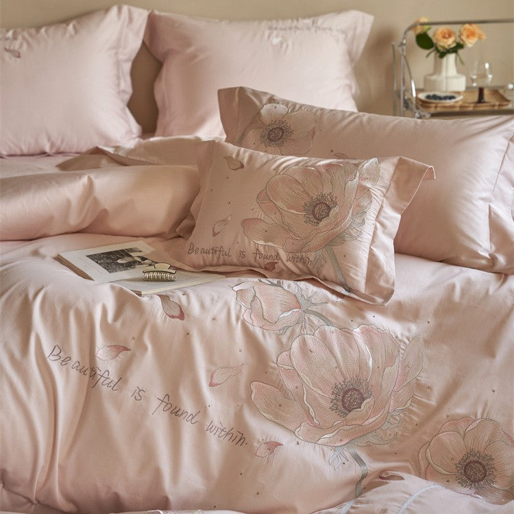 Satin bedding set with floral relief embroidery and velvety shine Bowlift