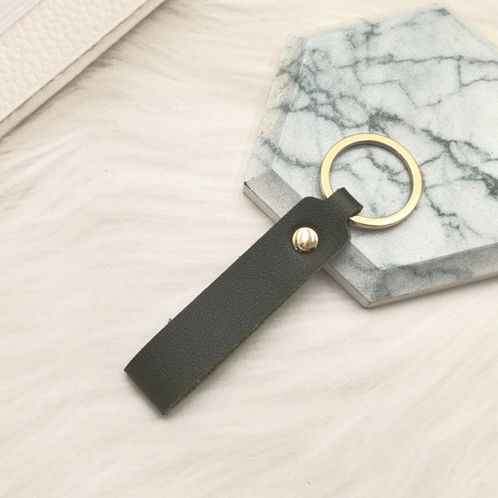 Unisex keychain with elegant artificial leather design Bowlift