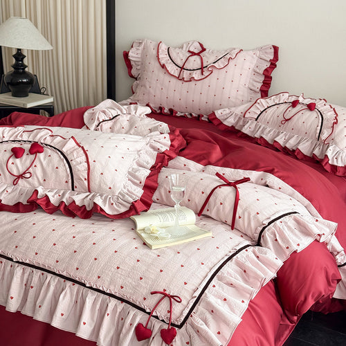 Romantic cotton bedding set with ruffle, heart embroidery and decorative pillow Bowlift