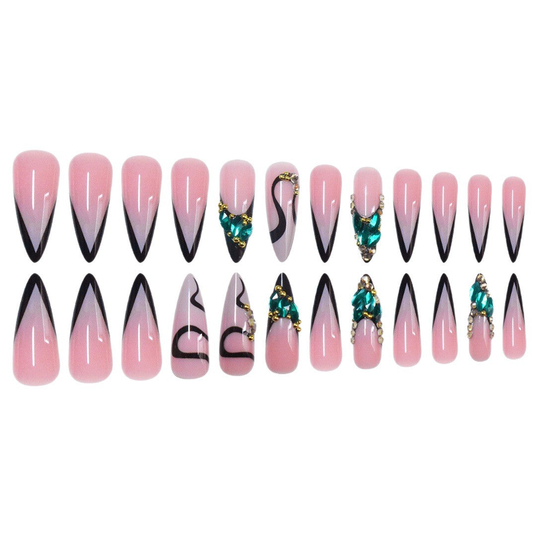 Artistic Stiletto Press-On Nail Art with Gemstone Accents Bowlift
