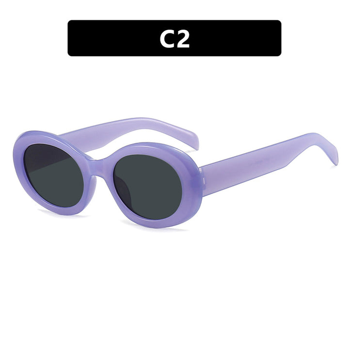 Women's fashionable sunglasses in original oval design with transparent frame and UV protection Bowlift