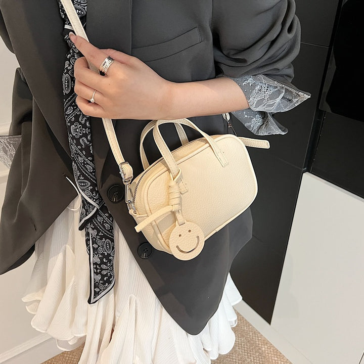 Compact Textured Mini Handbag Bowlift