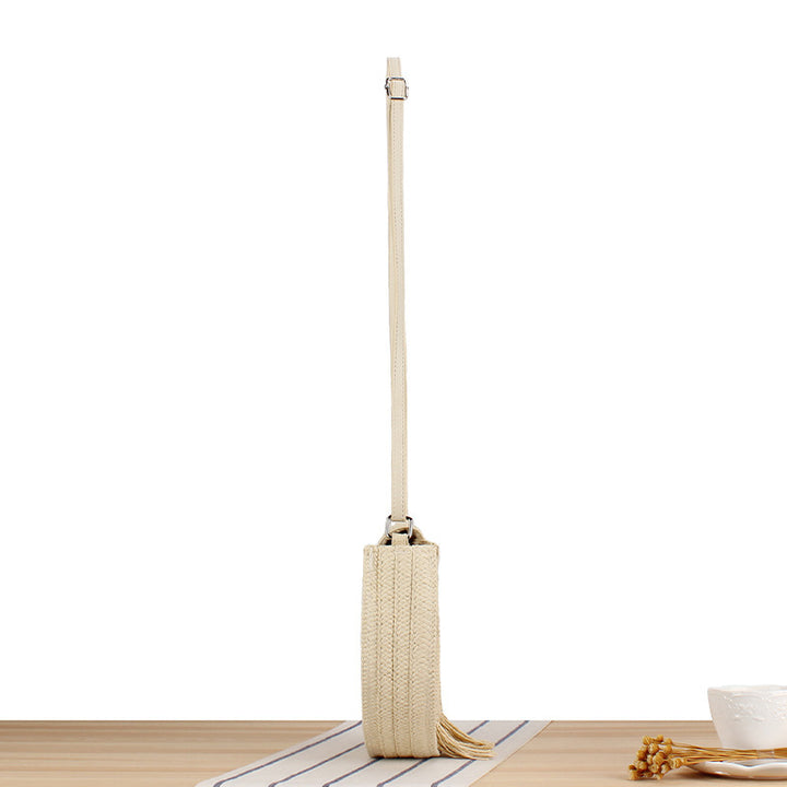 Round Bast Crossbody Bag with Tassels by Bowlift