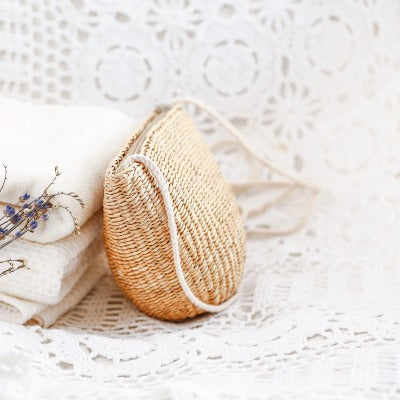 Handcrafted basket bag in unique half-moon design Bowlift