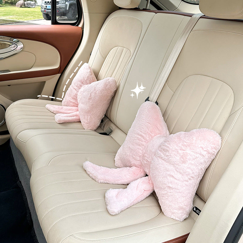 plush bow-shaped decorative throw cushion with long tails and faux-fur texture Bowlift