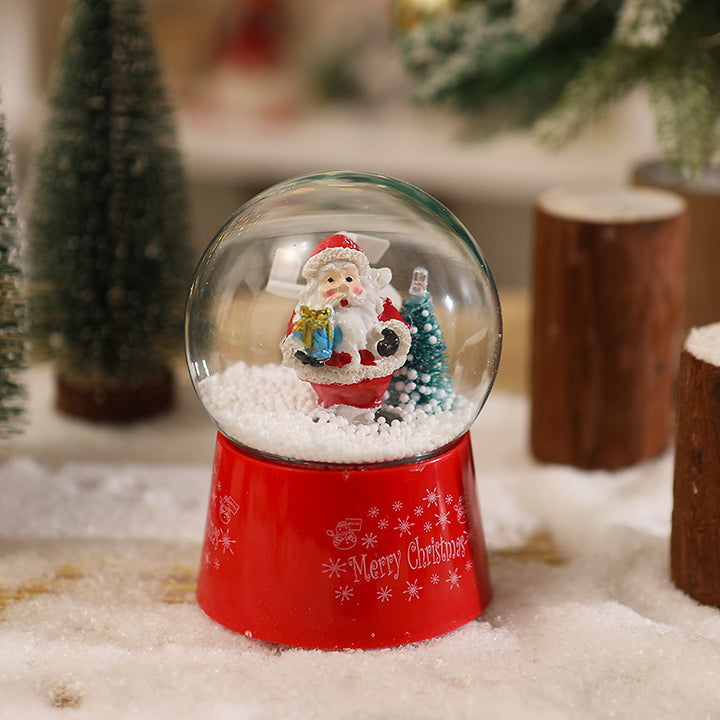 Snow globe with Santa Claus and Christmas tree Bowlift