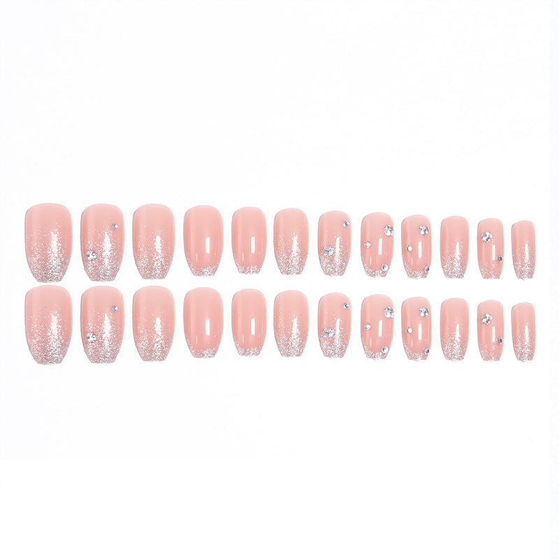 Glamorous artificial nails with glitter and rhinestone embellishments Bowlift