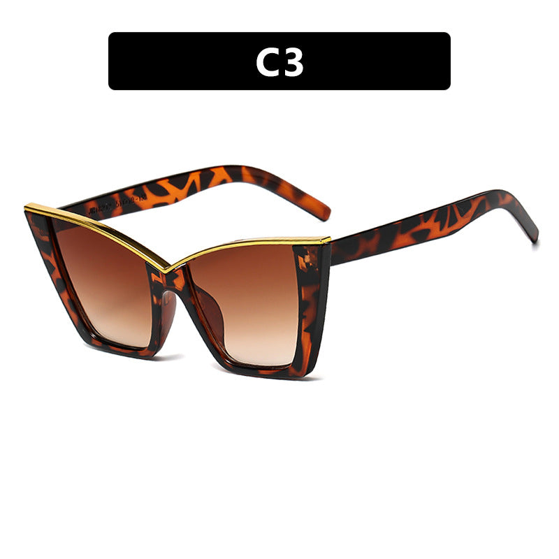 Women extravagant sunglasses with unique design and golden accents Bowlift