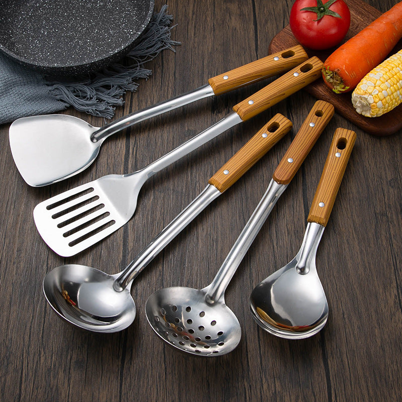 Slotted stainless steel turner spatula with ergonomic wooden handle Bowlift