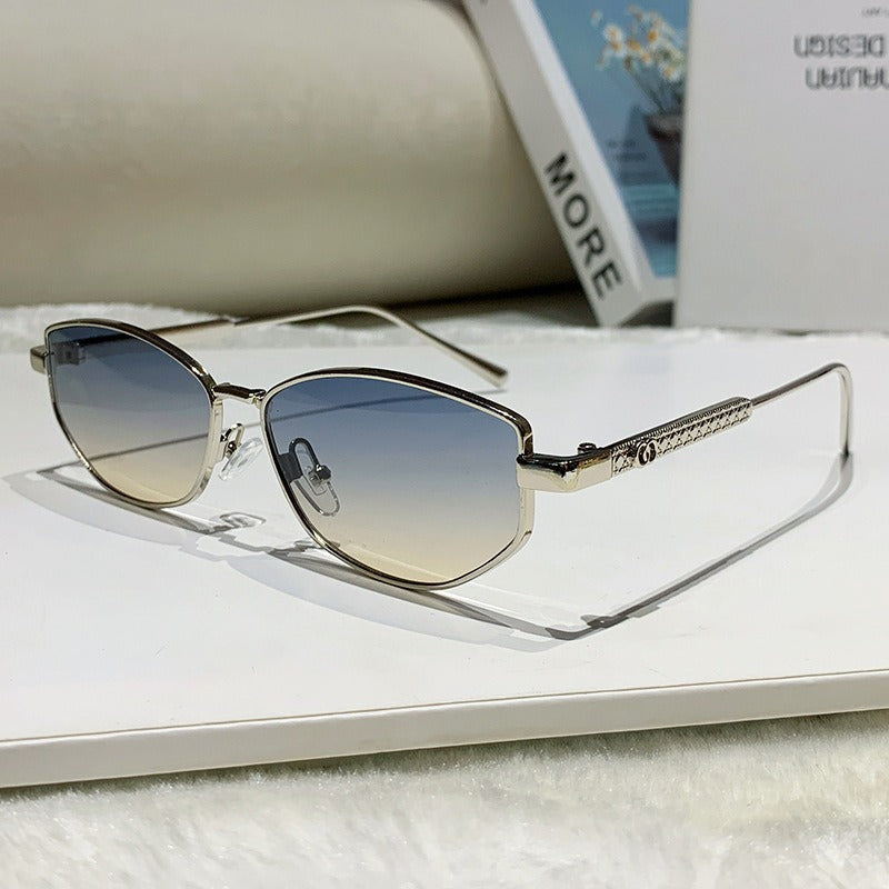 Women's elegant sunglasses with sparkling metal frame Bowlift