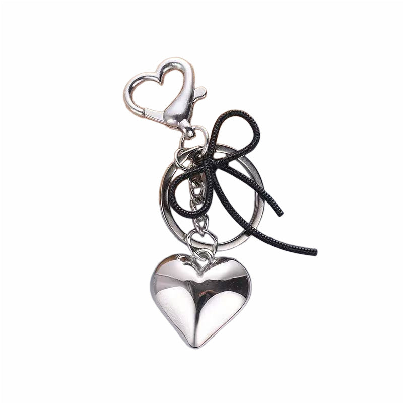 Heart-Shaped Metallic Keychain with Decorative Bow Bowlift