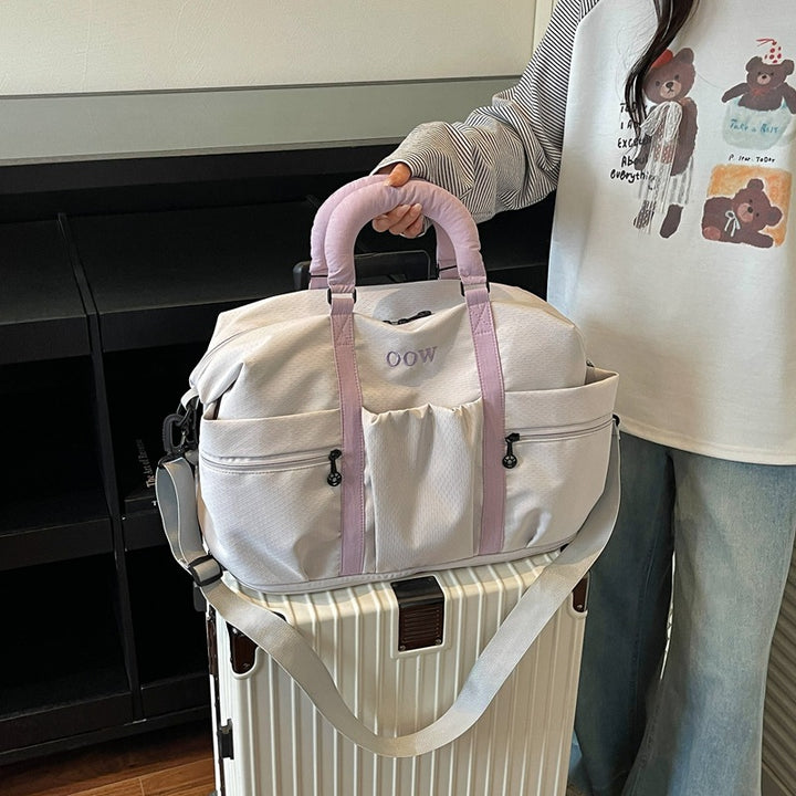 Sports bag with versatile compartment arrangement Bowlift