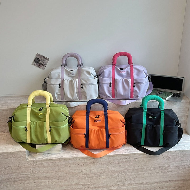 Sports bag with versatile compartment arrangement Bowlift