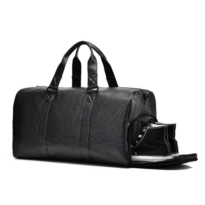 Travel bag made of high-quality leather with robust carrying handles Bowlift