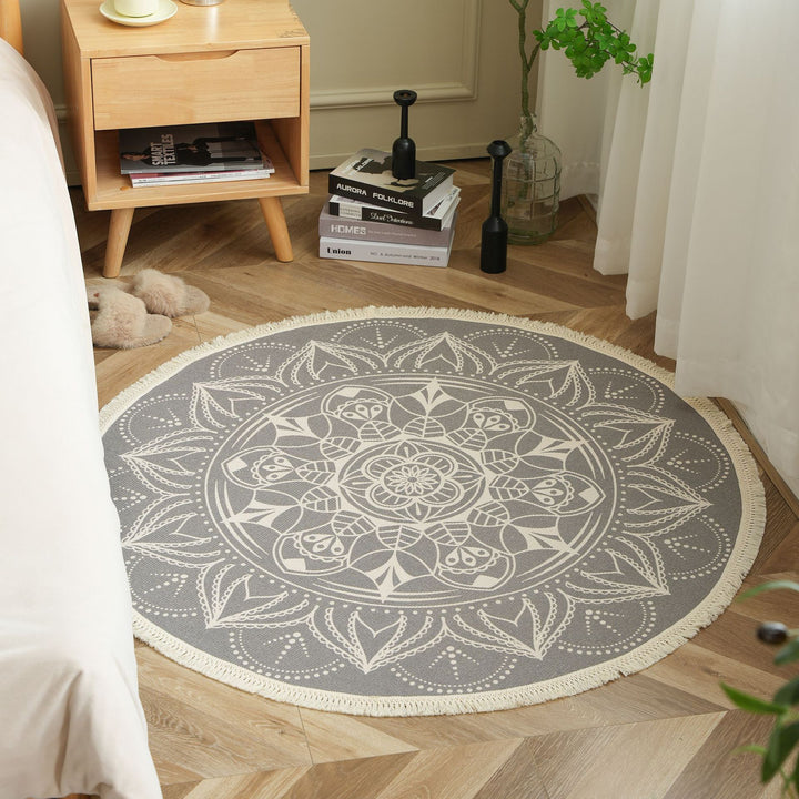 Round woven rug with mandala motif, flat cotton-jute mix and fringes Bowlift