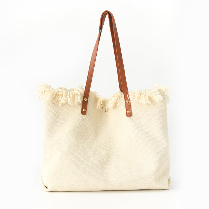 Beach bag with floral pattern and fringes Bowlift