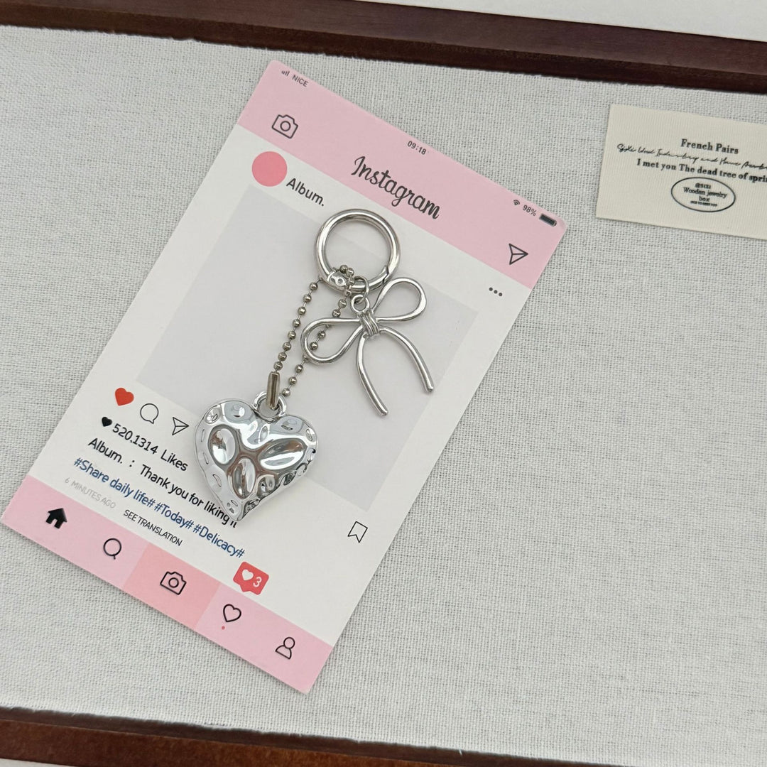 Heart-Shaped Charm Keychain with Bow Bowlift