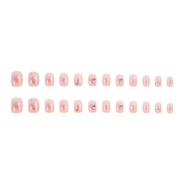 Acrylic nail set with sparkling star decorations and elegant accents Bowlift