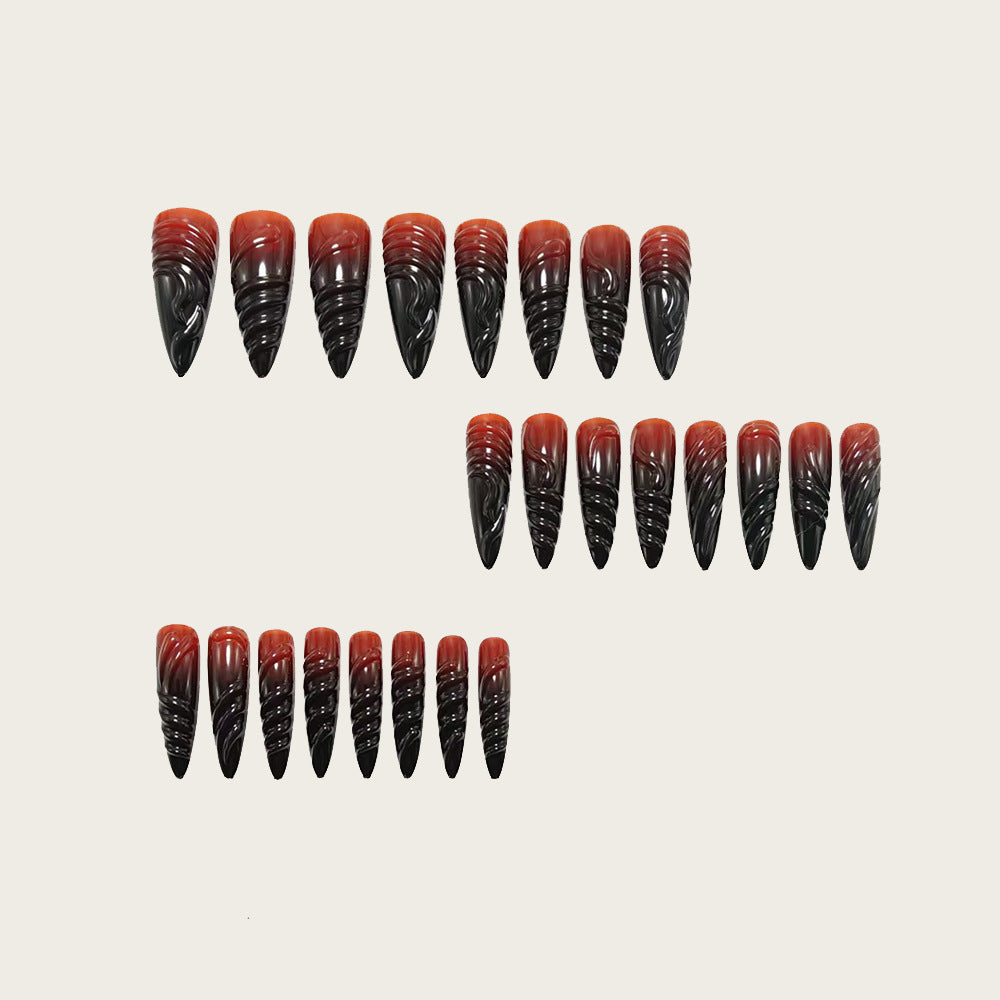 Gothic-style artificial nails with pointed tips and shiny surface Bowlift