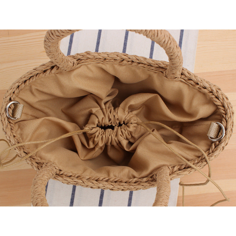 Braided tote bag with playful tassel detail Bowlift