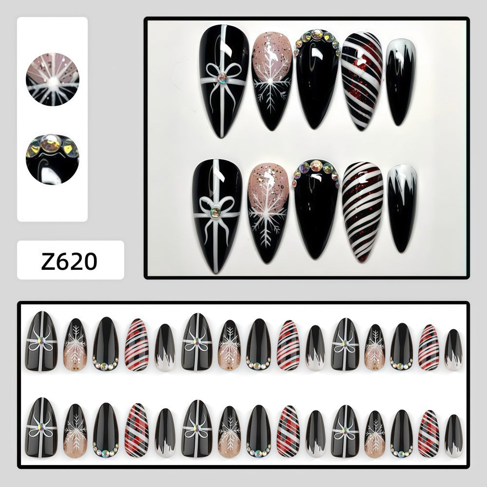 Artificial nail set with festive design and glitter accents Bowlift