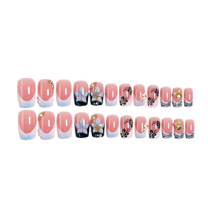 Artificial nails in creative floral design with glitter accents Bowlift